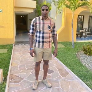 Selling a Burberry button down shirt. Fair condition. Sold as is,Size XL